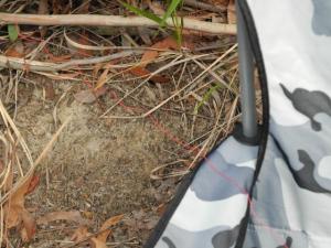 Wire antenna leaving operating position over chair arm.