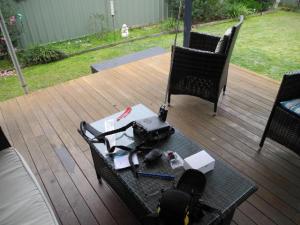 Overview of test set-up. FT817 running off internal batteries, Miracle Whip tuner, telescopic antenna and counterpoise going off into the garden.